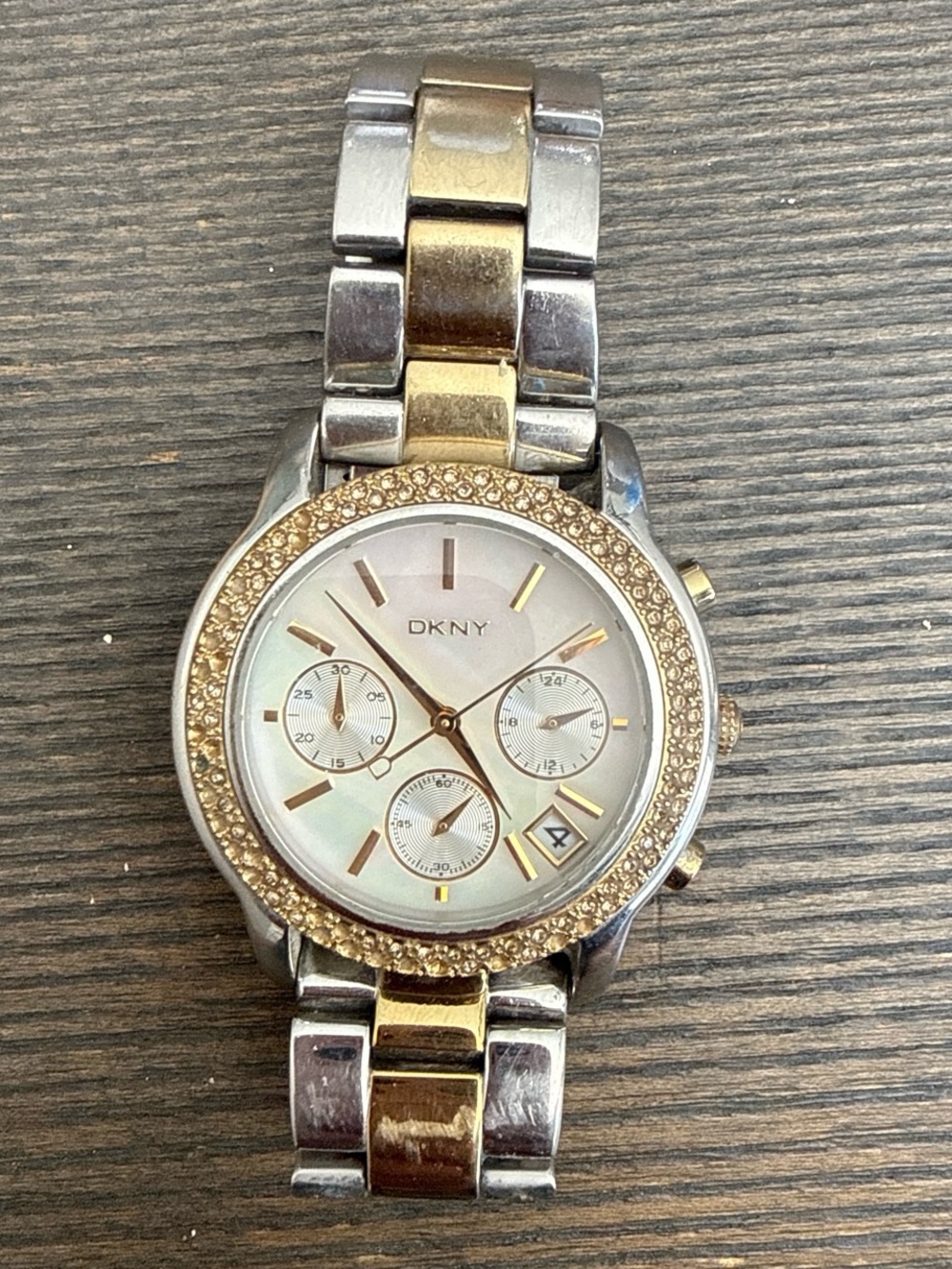 DKNY Two-Tone Gold and Silver locked&loaded women’s watch